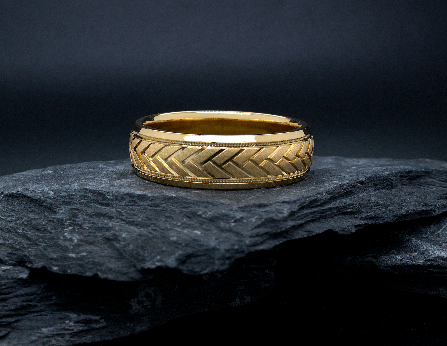 yellow gold ring, mens ring, womens ring, solid gold ring, 8mm ring, dome shaped ring, migrain, engraving, arrow pattern engraving, wedding band, mens wedding band, womens wedding band, ring on rocks