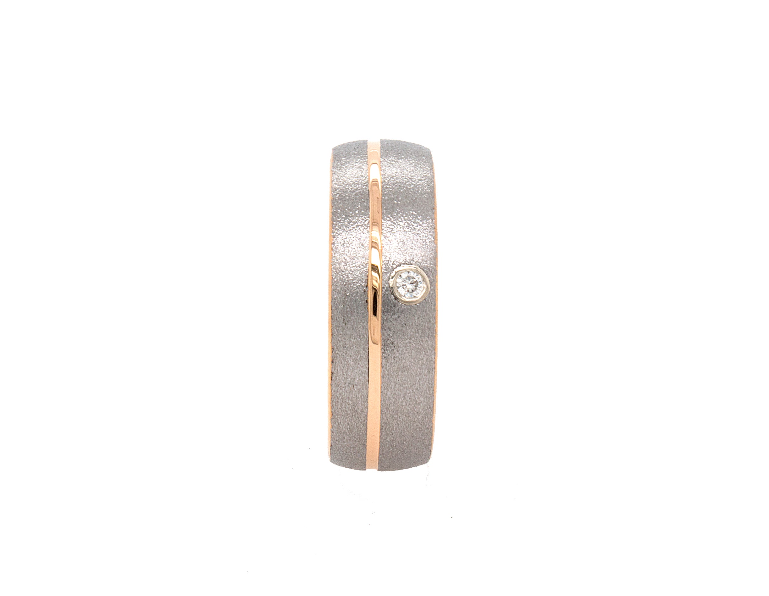 ring, ring on white background, ring with rose gold edges, ring with offset groove, ring with round cut diamond, diamond tungsten ring, tungsten ring, tungsten wedding band, mens wedding band, women's wedding band, matte tungsten ring, dome shaped ring