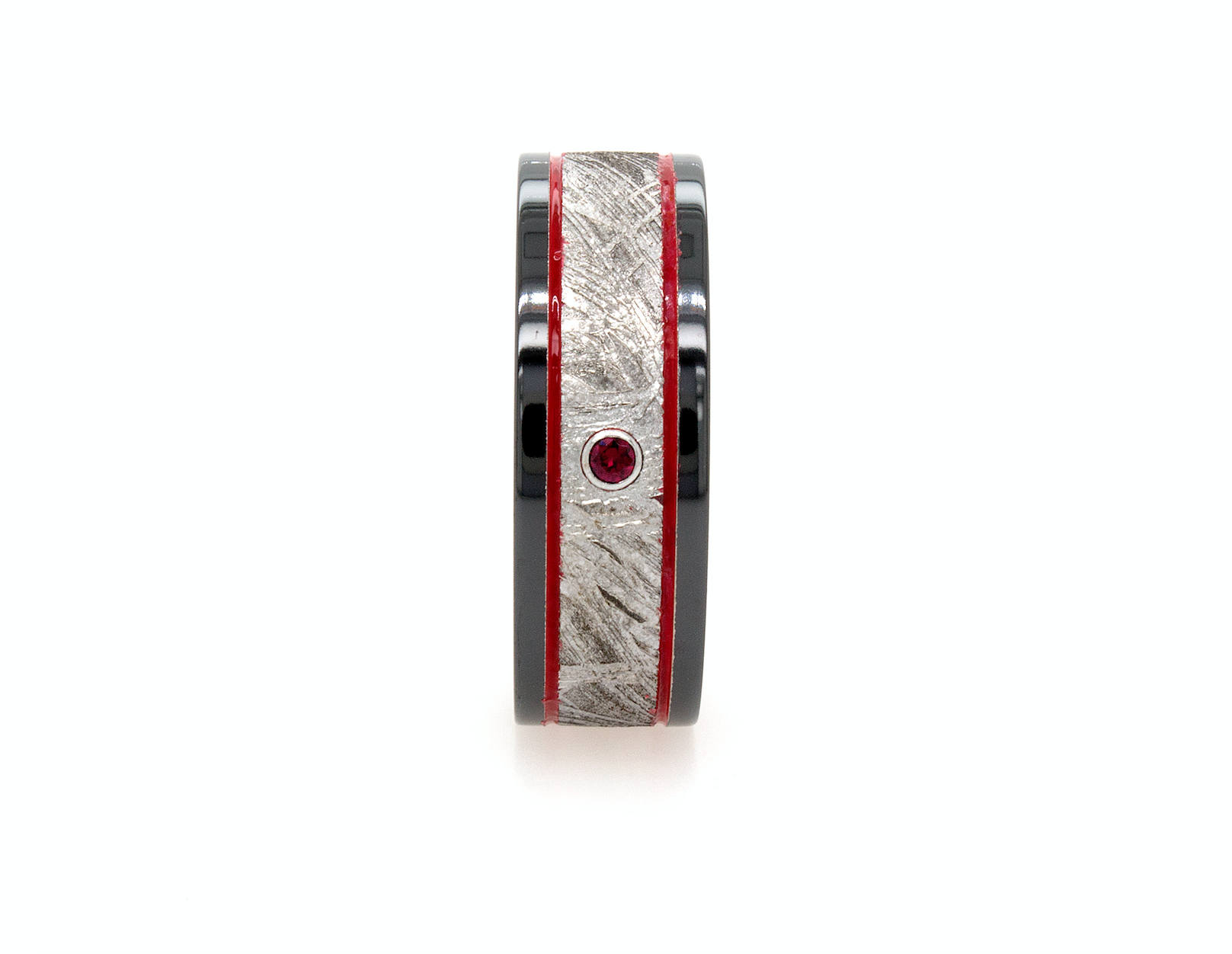 ring, ring on white background, black zirconium ring, black zirconium wedding band, wedding band, real meteorite ring, meteorite zirconium ring, garnet ring, round shaped garnet, ring with red lines, mens wedding band, women's wedding band