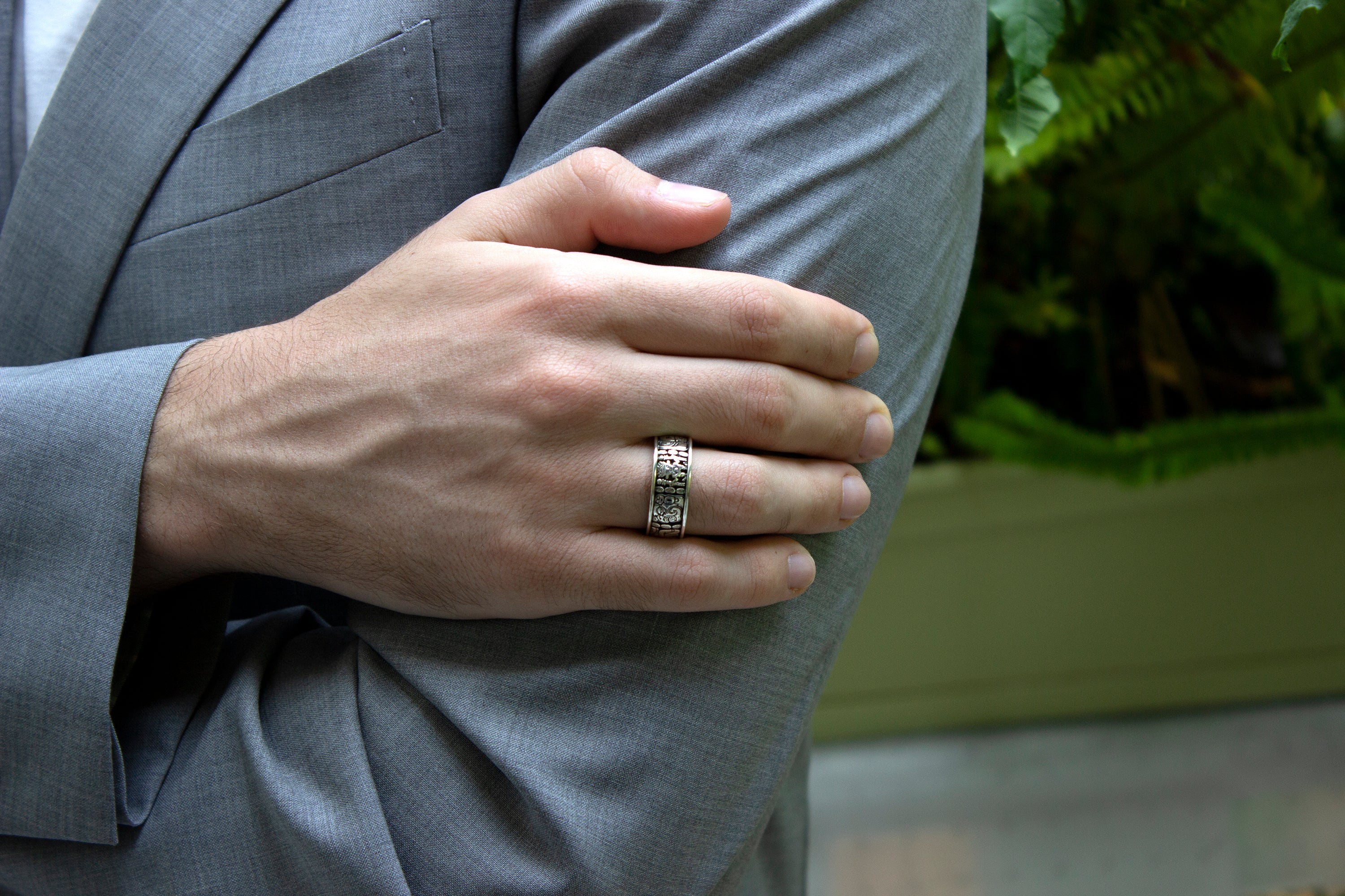 ring, ring on hand, mens ring, ring on model. silver rings, custom ring, personalized ring, mayan ring, engraved ring, ring with symbols