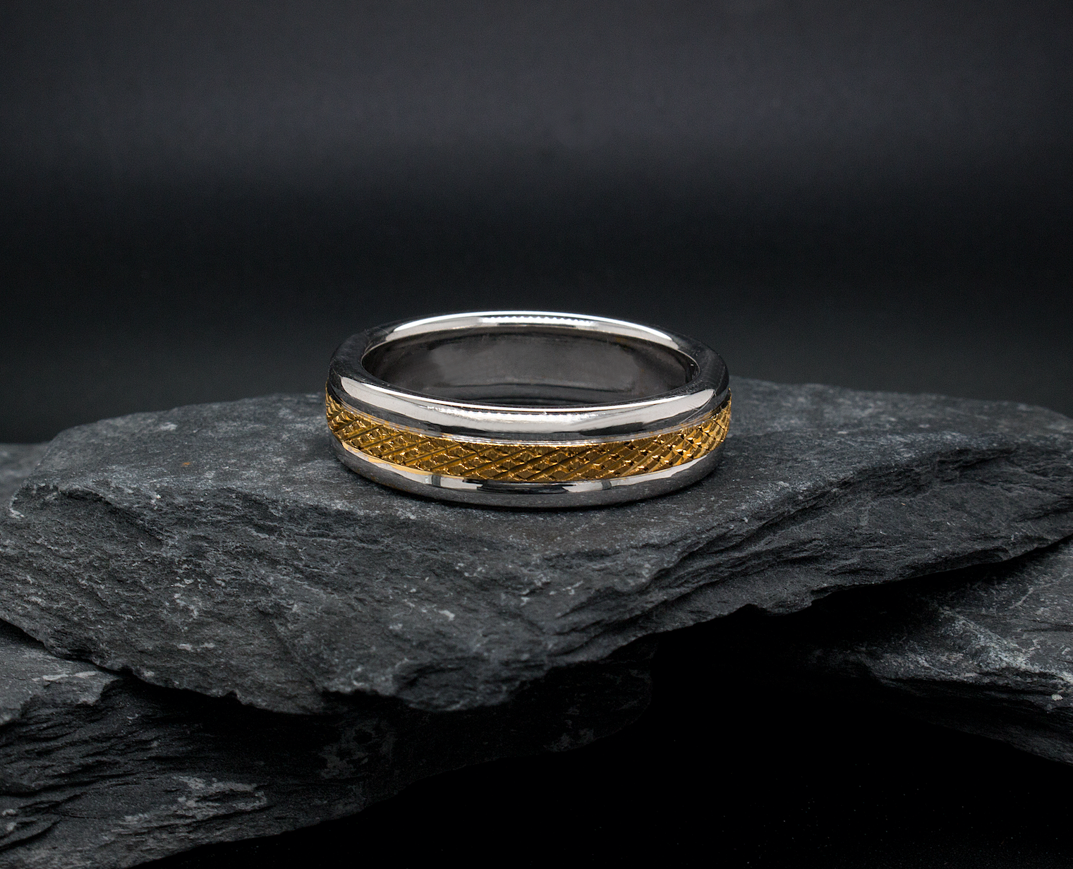 ring, ring on white background, solid gold ring, two-toned ring, white gold ring, yellow gold ring, cross hatch designs, pattern ring, texture ring, domed edges, wedding band, mens wedding band, womens wedding band