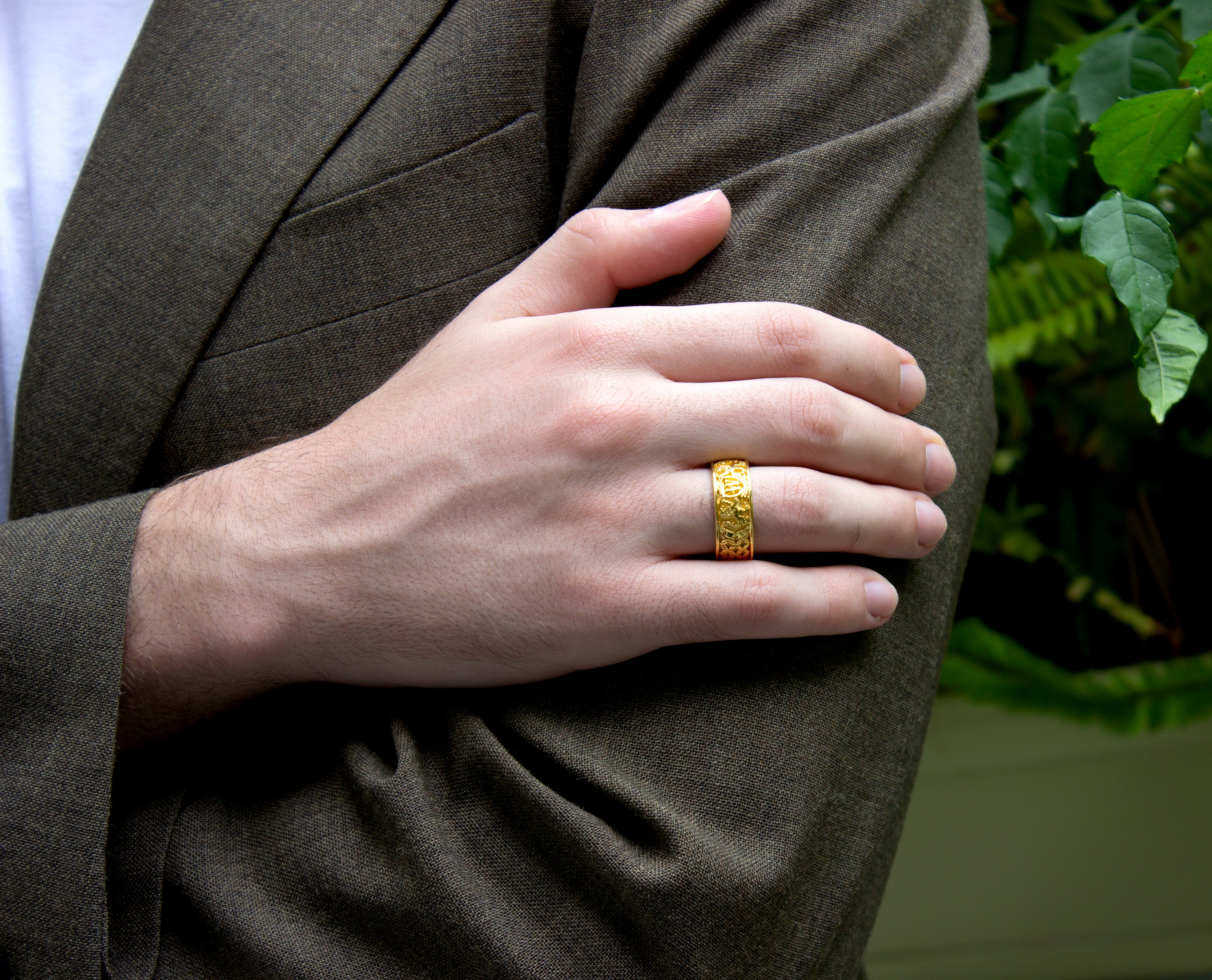 ring, ring on model, ring on hand,  gold ring, solid gold ring, yellow gold ring, engraved ring, ring with initial, ring with lions, medieval ring, wedding band, mens wedding band, womens wedding band, unisex ring, unique rings