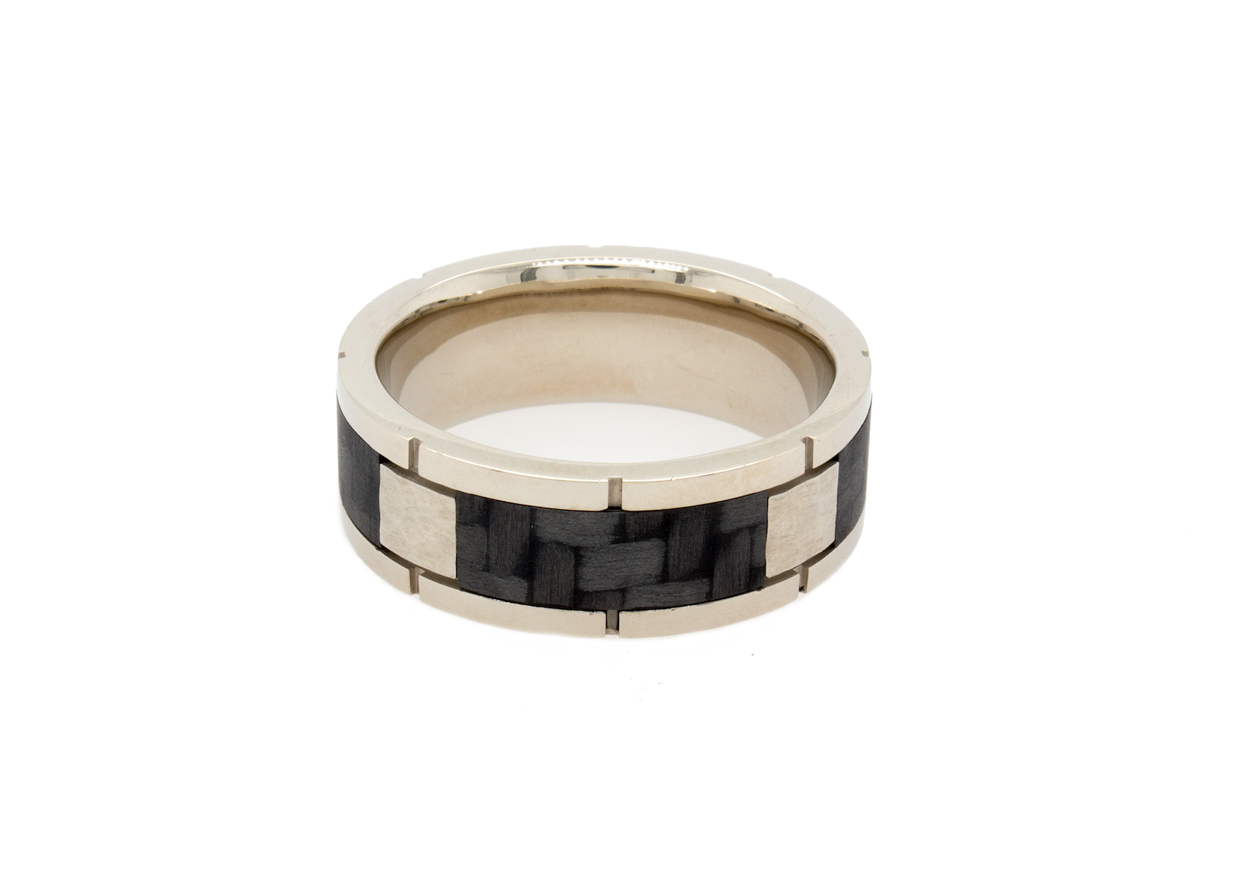 solid gold ring, ring on white background, gold ring, white gold wedding band, ring with carbon fiber, black carbon fiber inlay, square pattern ring, white gold wedding band, mens wedding band