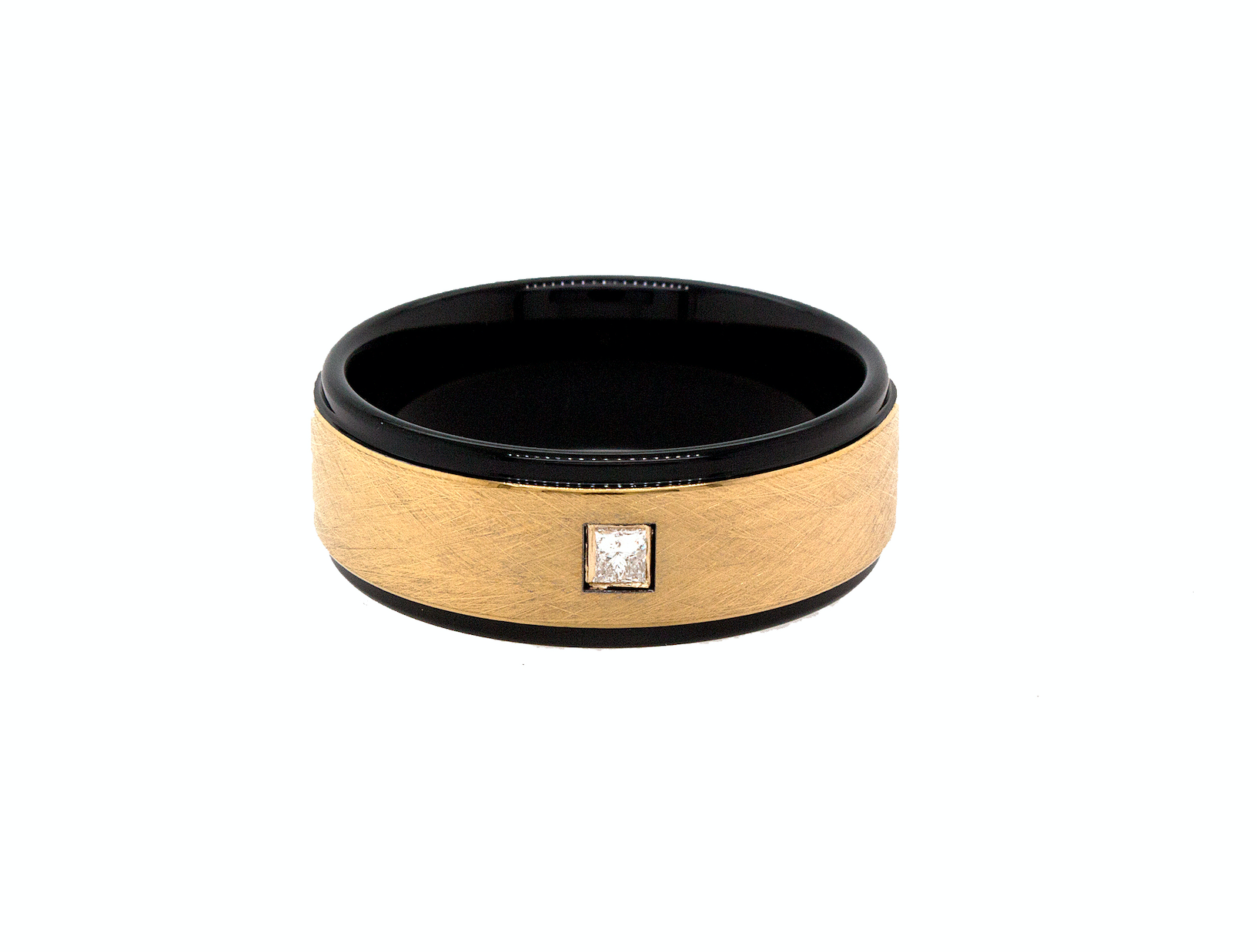 ring, ring on white background, yellow gold ring, black ring, yellow gold plated exterior, black plated edges and interior, square shaped diamond, diamond ring, tungsten ring, textured ring, wedding band, mens wedding band