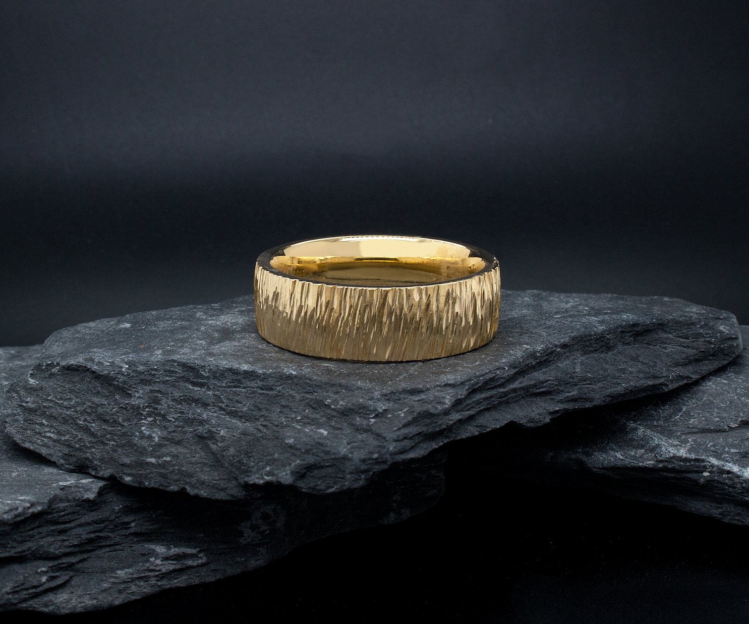 ring, ring on black  background, yellow gold ring, dome shaped ring, solid yellow gold ring, tree bark texture, textured ring, tree bark ring, custom ring, mens ring, womens ring, unisex ring, wedding band, wedding band for men, 8mm ring
