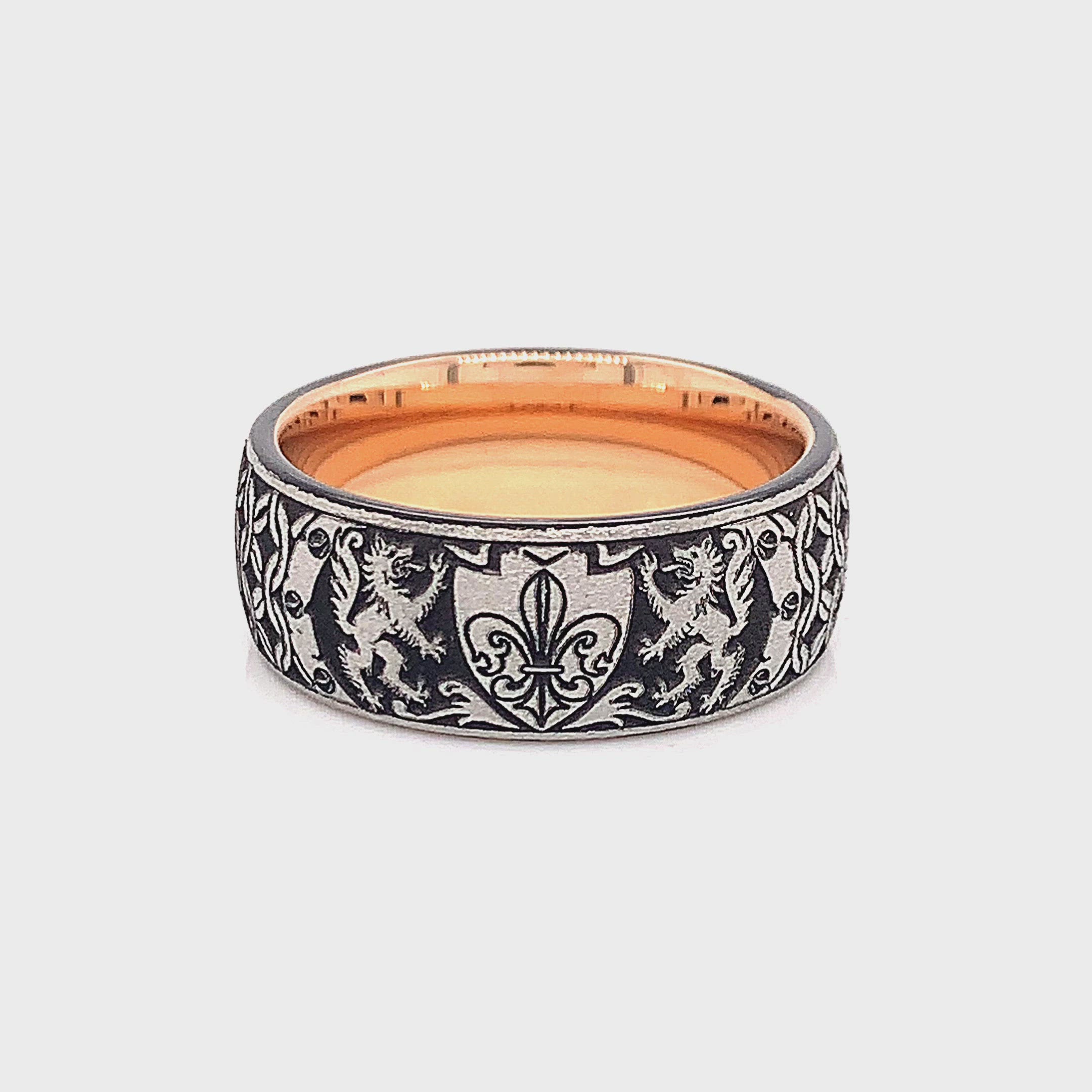 tungsten ring, wedding band, mens wedding band, women's wedding band, tungsten ring with rose gold plated interior, rose gold plated ring, fleur de lis ring, engraved ring, engraved wedding band, custom wedding band, personalized ring, mens wedding band, women's wedding band, rose gold ring, ring with shield, ring with wolves, wolf engraving  Edit alt text