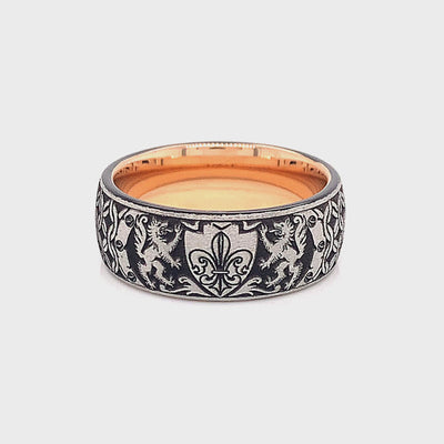 tungsten ring, wedding band, mens wedding band, women's wedding band, tungsten ring with rose gold plated interior, rose gold plated ring, fleur de lis ring, engraved ring, engraved wedding band, custom wedding band, personalized ring, mens wedding band, women's wedding band, rose gold ring, ring with shield, ring with wolves, wolf engraving  Edit alt text