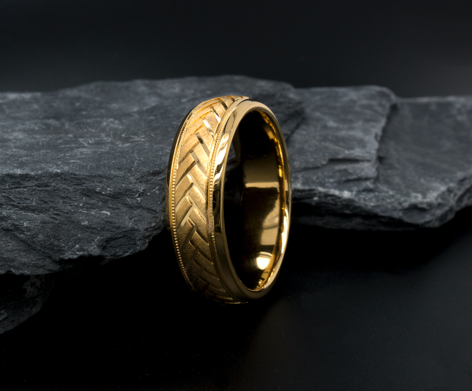 yellow gold ring, mens ring, womens ring, solid gold ring, 8mm ring, dome shaped ring, migrain, engraving, arrow pattern engraving, wedding band, mens wedding band, womens wedding band, ring on rocks