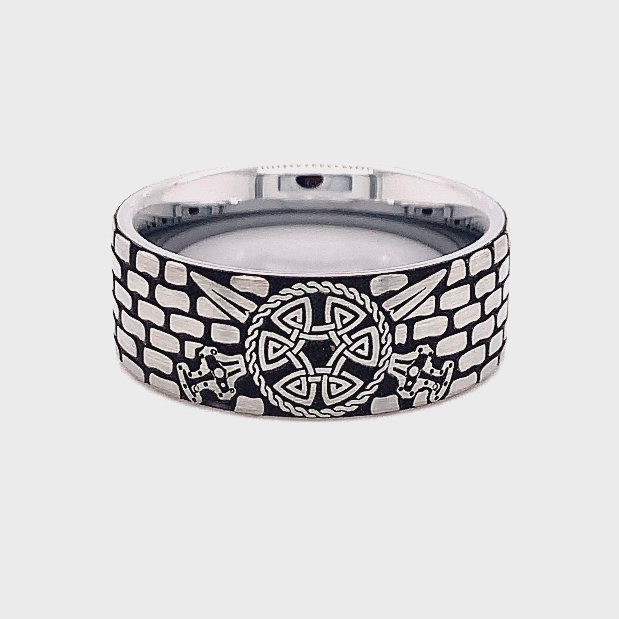 ring, tungsten ring, ring on white background, tungsten wedding band, ring with brick pattern, brick ring, viking ring, ring with viking shield, shield, viking shield, ax, sword