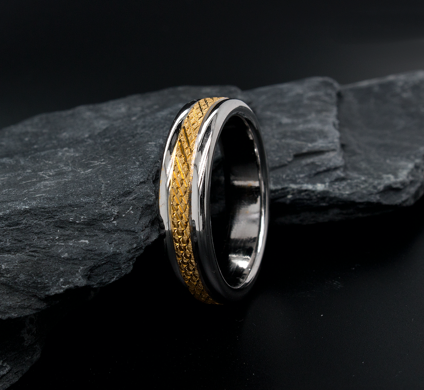 ring, ring on white background, solid gold ring, two-toned ring, white gold ring, yellow gold ring, cross hatch designs, pattern ring, texture ring, domed edges, wedding band, mens wedding band, womens wedding band