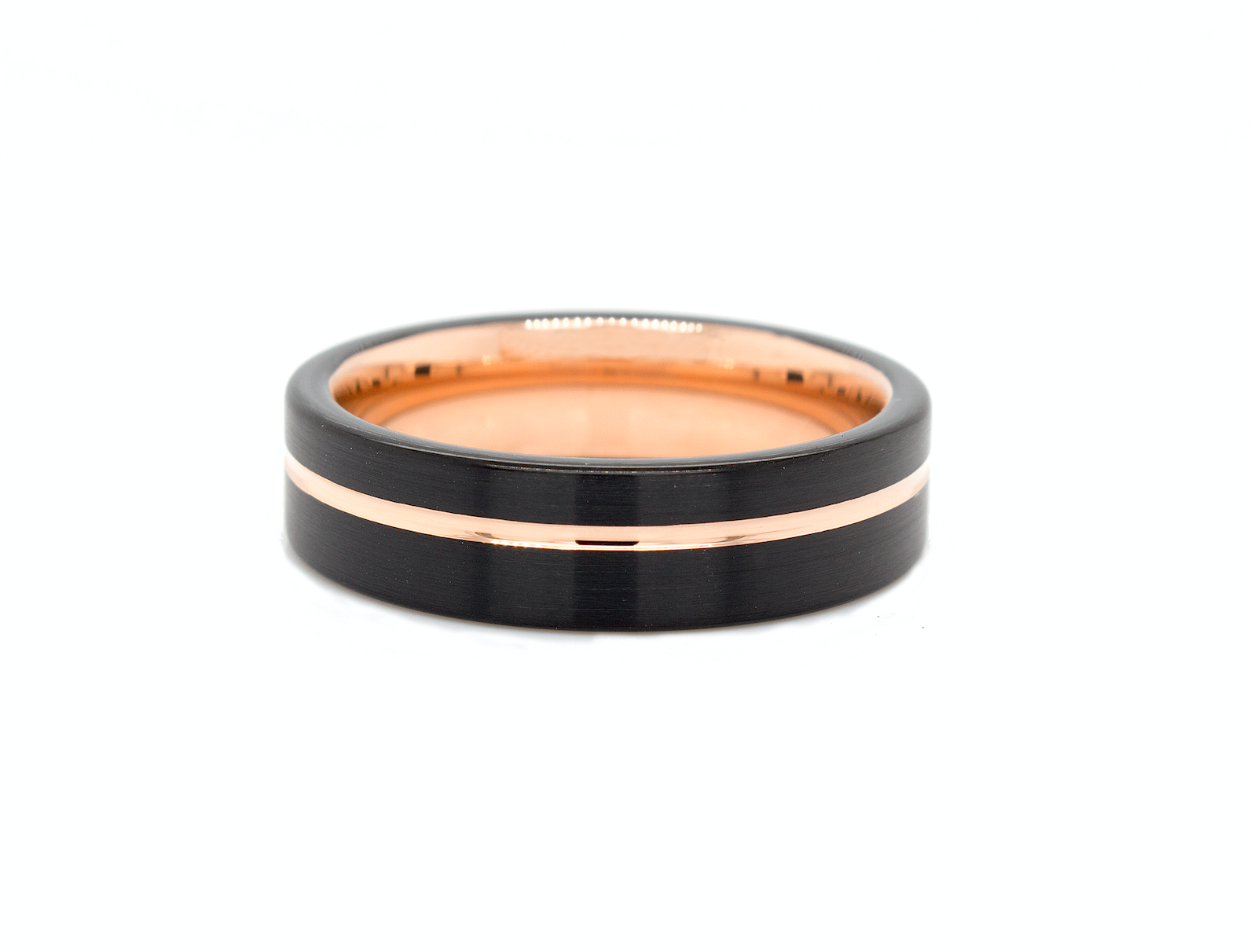 ring, ring on white background, black ring, rose gold ring, black plated tungsten, tungsten wedding band, rose gold wedding band, flat shaped ring, brushed tungsten ring, ring with offset groove, black and rose gold ring, wedding band, mens wedding band, women's wedding band